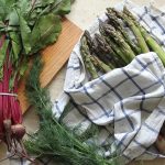 Asparagus and radishes on a towel
