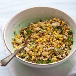 A bowl of street corn salad