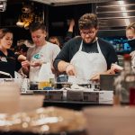 Students work together to prepare recipes.