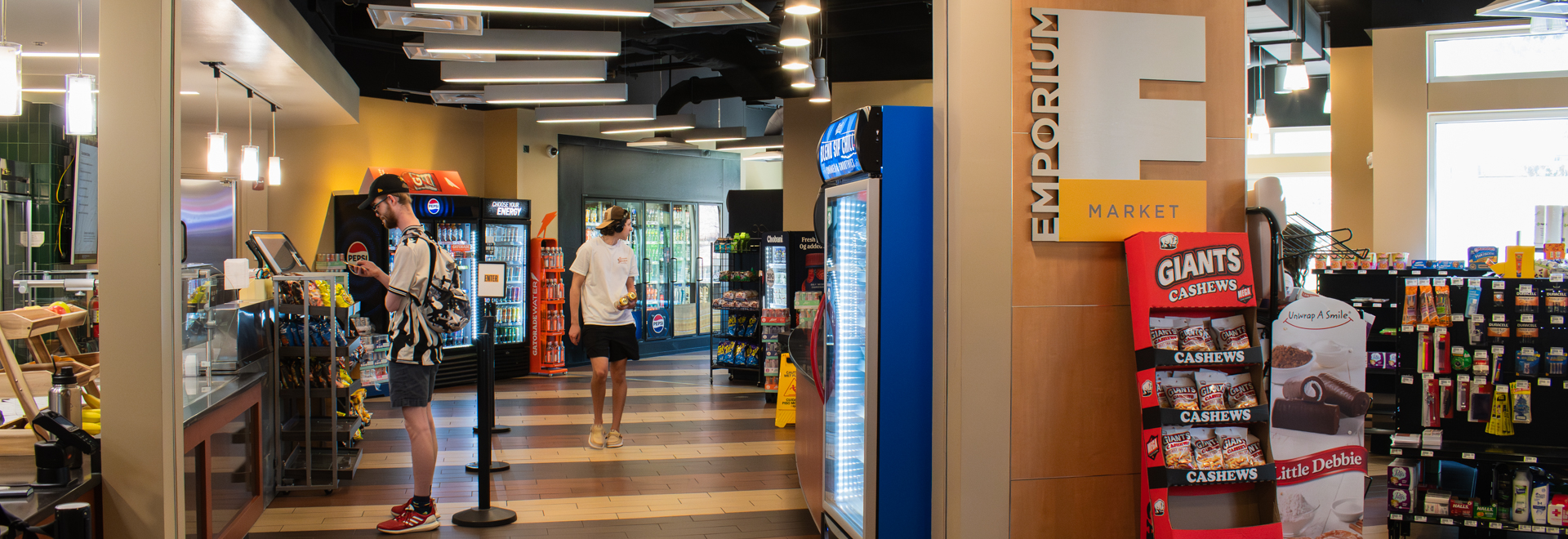 Emporium market photo showing students shopping