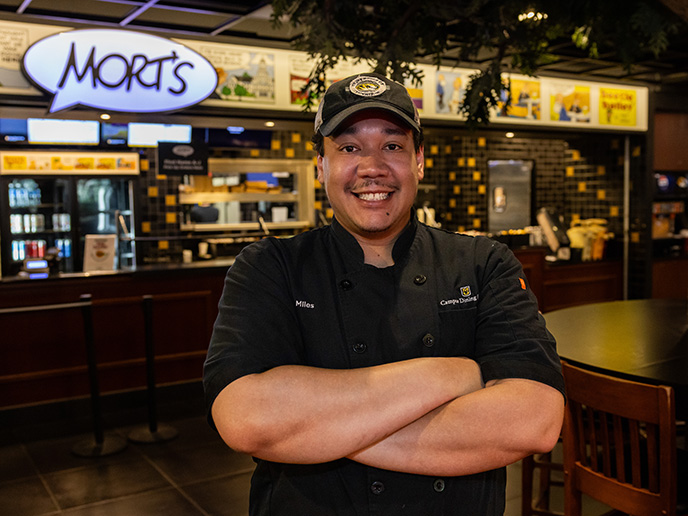 Mort's employee smiling confidently